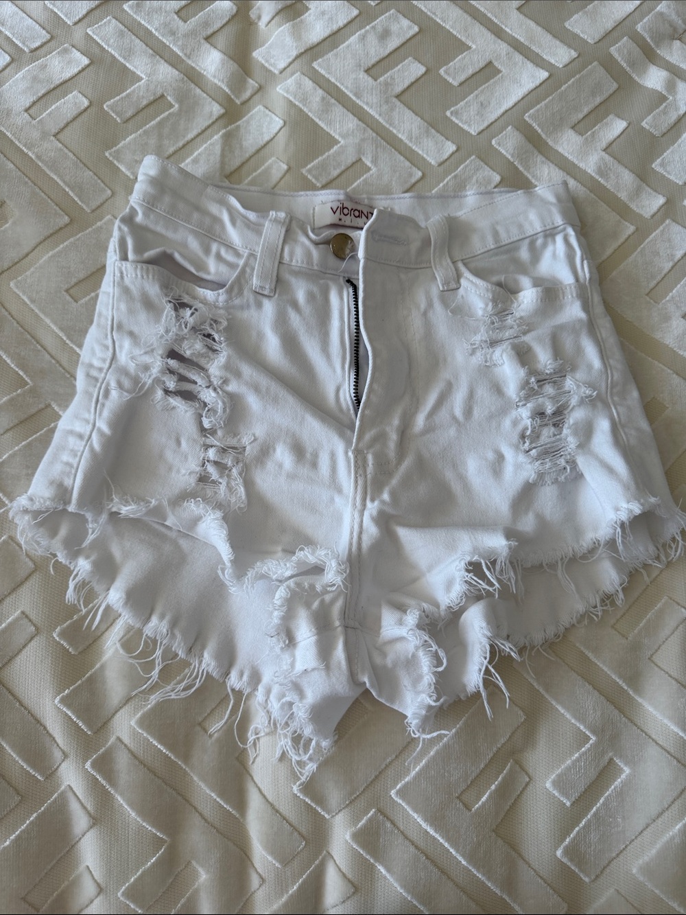 Vibrant White Ripped High-Rise Denim Cutoff Shorts